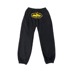 Corteiz Alcatraz Black Sweatpants — Signature Yellow Oval Logo on Relaxed-Fit Joggers